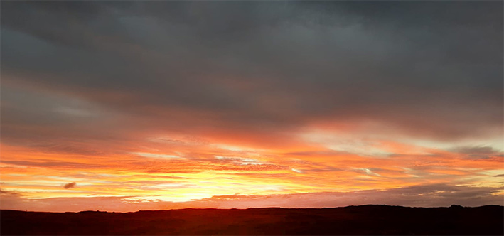 photo by Fearghas Mac Lochlainn of sunrise in Spiddal